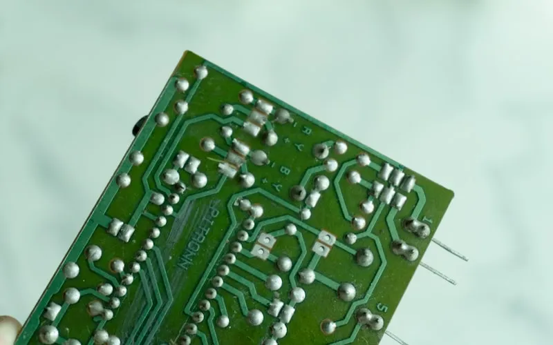 Close-up of electronic circuit board components inside a machine vision camera system