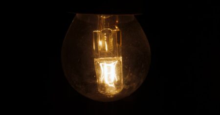 Tungsten Bulb Filament: 5 Dangerous Lies LED Brands Sell (2026) tungsten bulb filament featured image showing industrial robotic arm in a factory environment